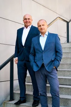 smiling restaurant manager in elegant uniform